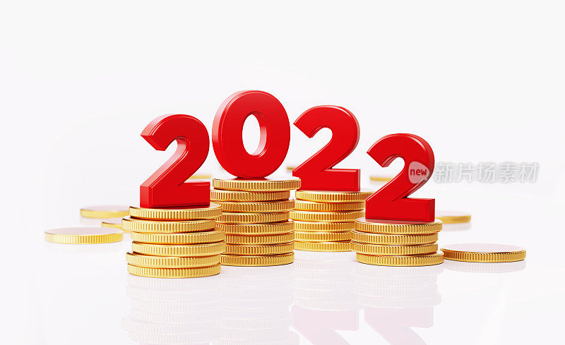 2022年的数字坐在硬币堆- 2022年商业计划和财务目标的概念